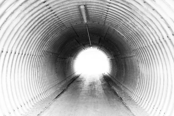 istock Black and white of tunnel 1252285347