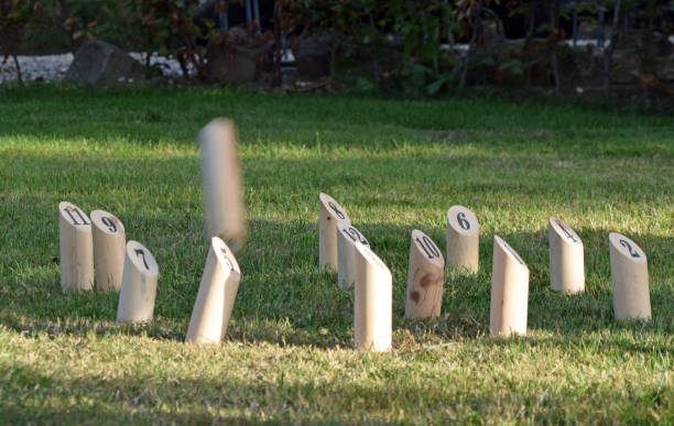 Colorful lawn bowling balls lying on the grass