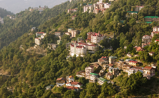 A view of the hotels and the houses spread around the forested slopes in the Himalayan hill station of Shimla.