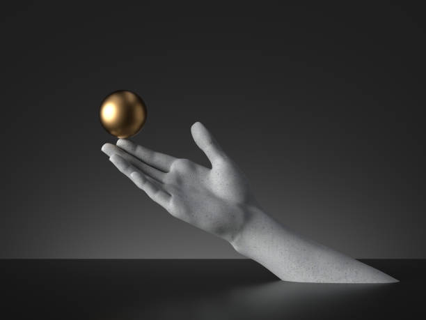 istock 3d render, mannequin hand holding golden ball, open palm gesture isolated on black background. Modern minimal fashion concept, simple clean design. Concrete sculpture. Human limb prosthesis 1252288092