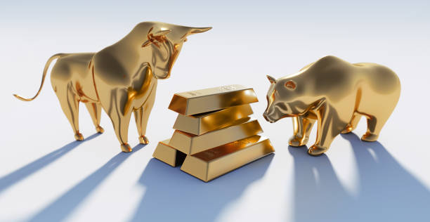 istock Golden Bull and Bear with Gold Bars 1252292380