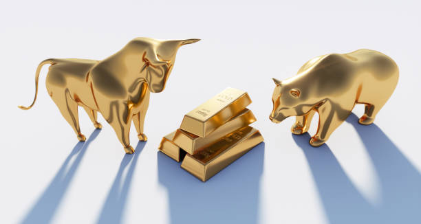 istock Golden Bull and Bear with Gold Bars 1252292392