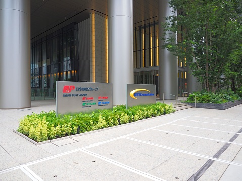 Chiyoda Tokyo/Japan-Jul15,2019:Japan Post Group,insurance bank post and holdings, NTT communications company logo sign