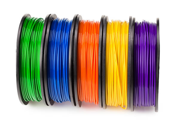 istock Black, red, blue, green, violet, orange, yellow, white filament 3d printer isolated on white background 1252295968