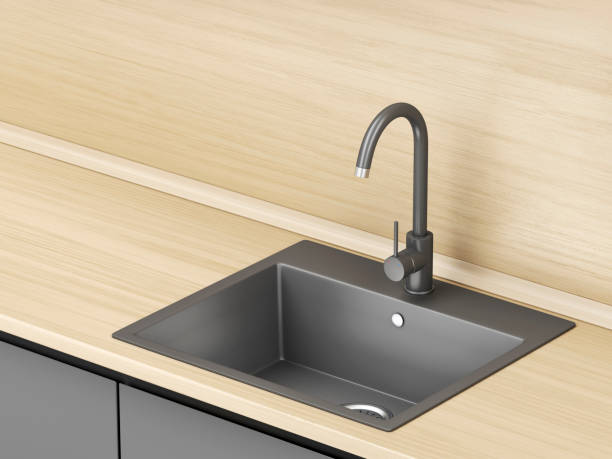 istock Kitchen with black faucet and sink 1252296702