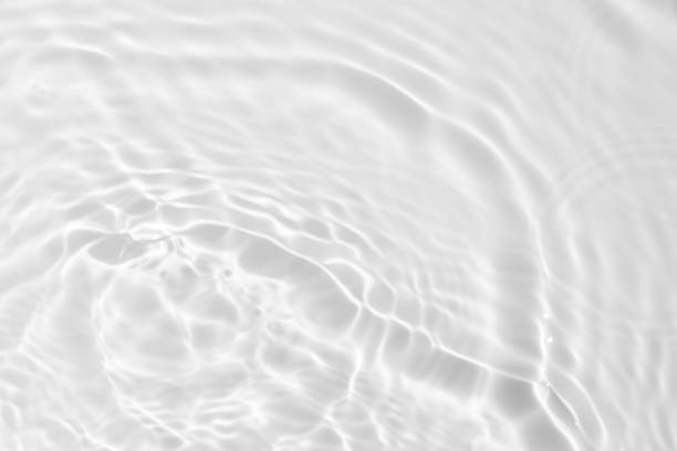 istock desaturated transparent clear calm water surface texture 1252304011