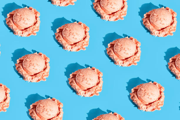 istock Pink sweet cherry-berry scoop ice cream on light blue 1252318430