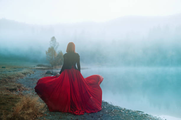 istock Blue atmospheric mood and red skirt 1252320061