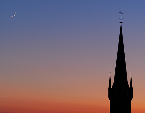 Church Silhouette With New Moon at dusk in dresden germany