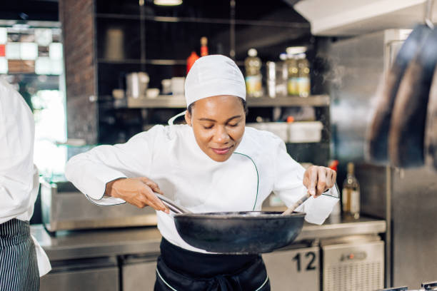 istock Female chef enjoying cooking 1252338142
