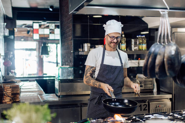 istock Skilled chef working at the restaurant 1252338674