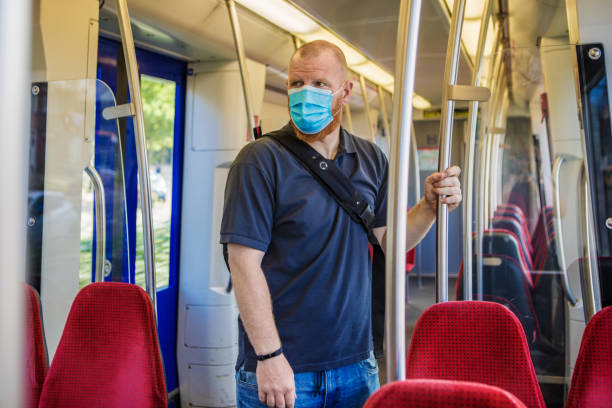istock A male worker on a european train during virus outbreak 1252346011