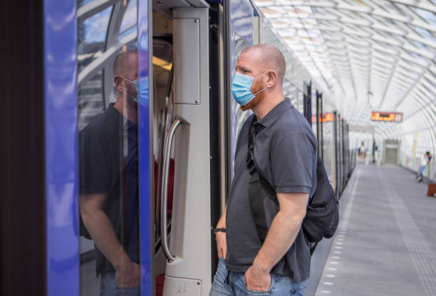 istock A male worker at a european train station during virus outbreak 1252349974