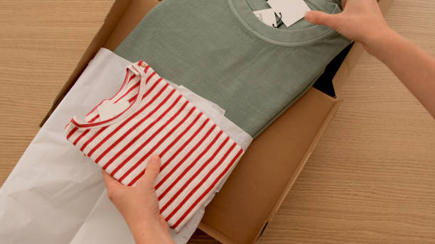 istock Unpacking a parcel of clothes 1252349980