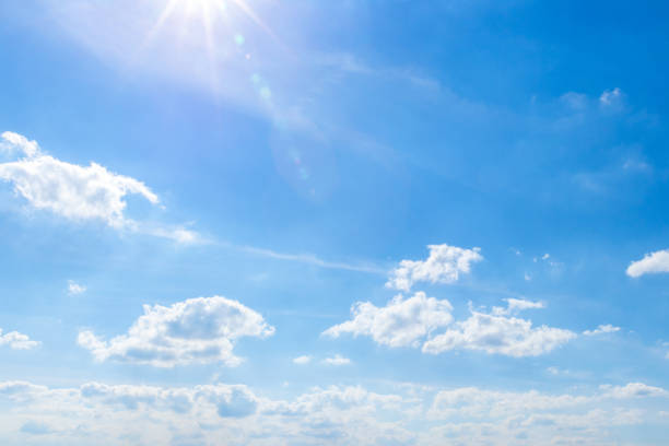 istock beautiful blue sky background with cumulus clouds and a bright sunny day 1252354350