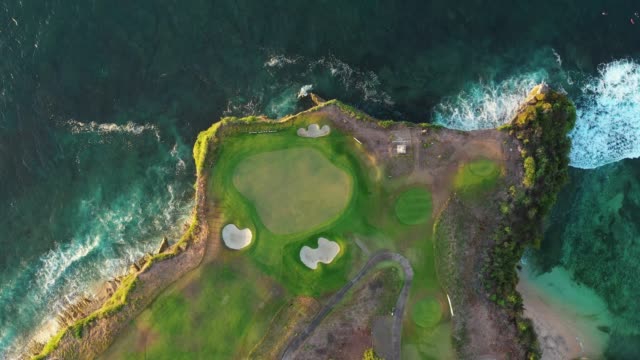 different colorful spots on small green island cape surface