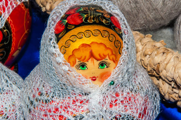 istock Matryoshka doll in Orenburg downy shawl 1252374578