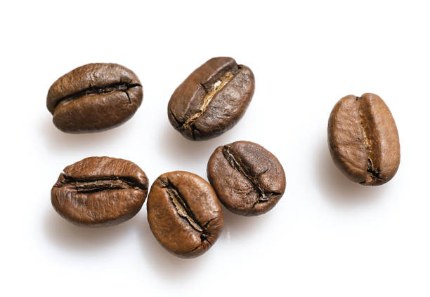 istock Group of coffee beans isolated on white background 1252380554