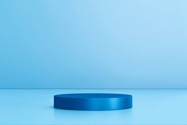 istock Blank product display on blue studio background with pedestal or podium. Empty showcase stand backdrops. 3D rendering. 1252381906