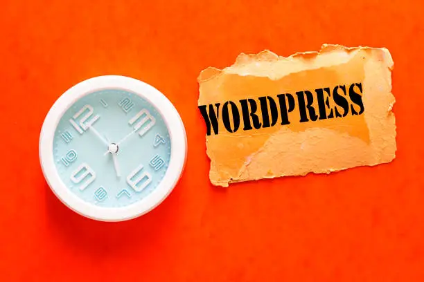 Writing note showing Wordpress