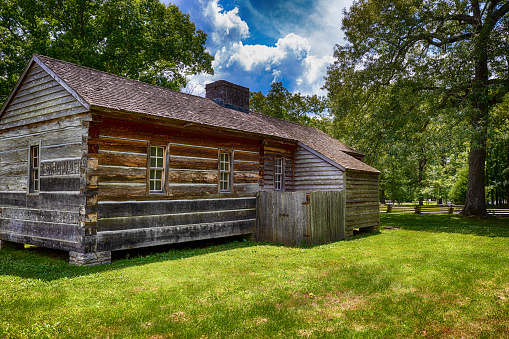 Natchez Trace Parkway, Tennessee, USA:  A wood building on the site and ruins of the Grinder house where Merriwether Lewis died on October 11, 1809