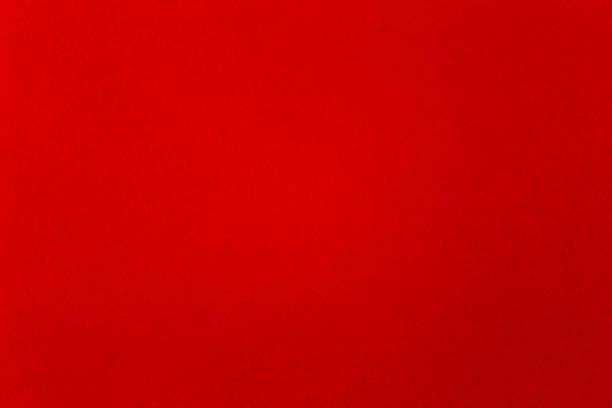 istock Red Coloured Parchment Sheet Close Up for Background 1252391977