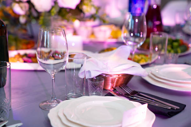istock plates and glasses on holiday table, setting for wedding or birthday. 1252393912