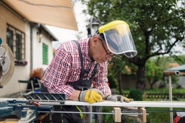 istock A senior man marks the board for cutting 1252394083