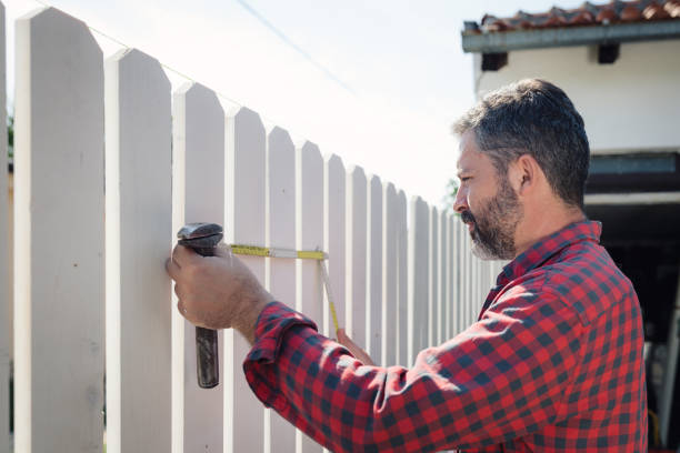 istock Craftsman measures a wooden board 1252394103