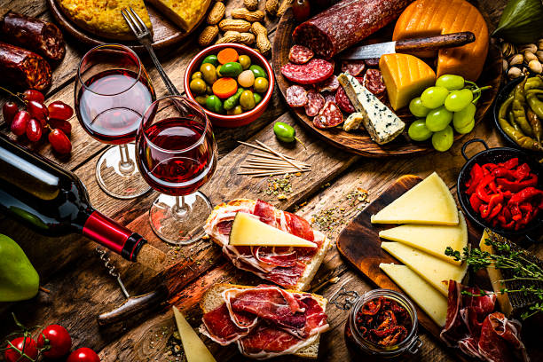 istock Delicious appetizer wuit red wine on rustic wooden table 1252394691