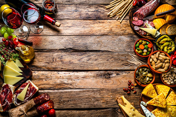 istock Delicious appetizer background on rustic wooden table. Copy space 1252394693