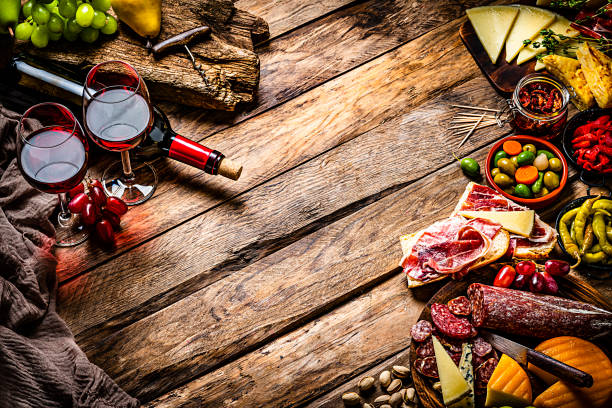 istock Delicious appetizer background on rustic wooden table. Copy space 1252394774