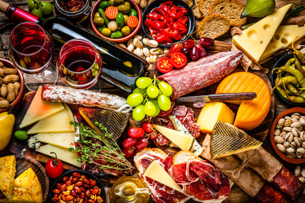 istock Delicious appetizer with red wine on rustic wooden table 1252394816