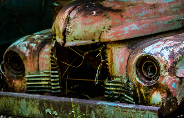 istock Old Junk Yard Cars 1252401576