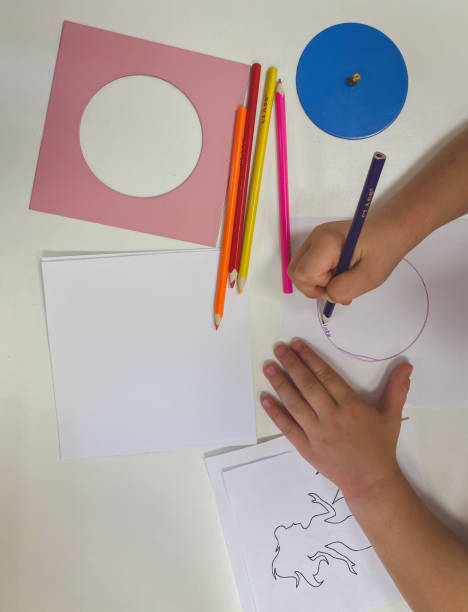 istock child draws with pencils on paper 1252402119