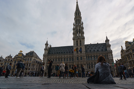Brussels, Belgium - June 5 2019: The Grand Place. Beautiful medieval architecture. A lot of tourists. People resting, sightseeing, making photography here. International landmark. Touristic concept.