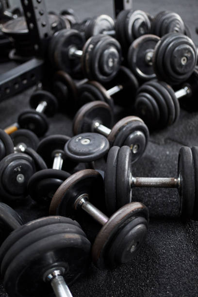 istock Rack with dumbbells ready for workout. Gym equipment 1252404888