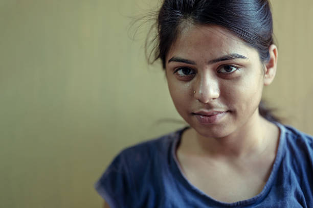 istock Sad or unhappy young woman looking at camera 1252405038