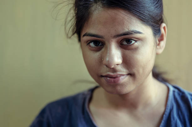 istock Sad or unhappy young woman looking at camera 1252405049