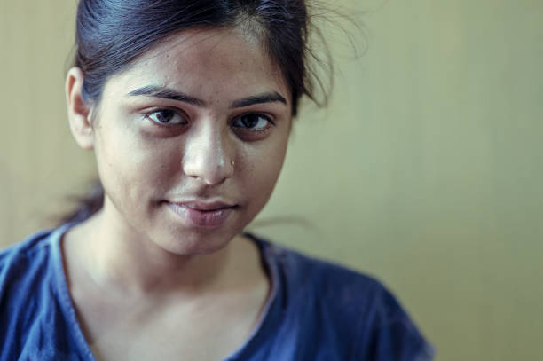 istock Sad or unhappy young woman looking at camera 1252405052