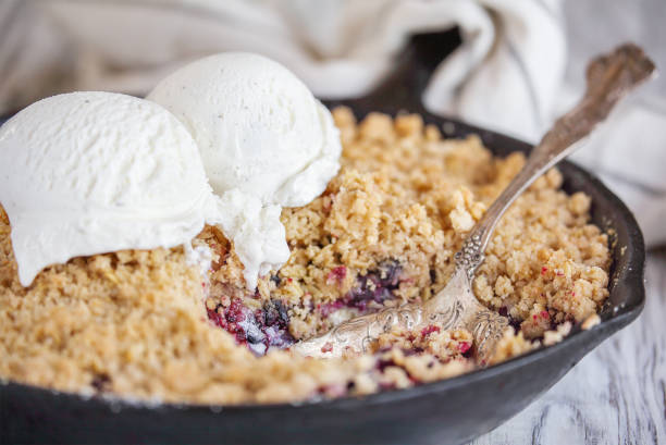 istock Blackberry Cobbler Baked in a Cast Iron Pan with Ice Cream 1252408931