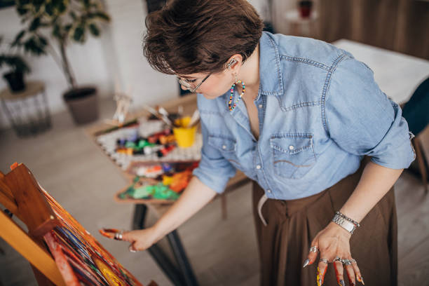 istock Creative artist painting on canvas 1252410319