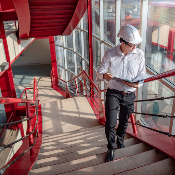 istock Asian civil engineer man working at construction site 1252411610