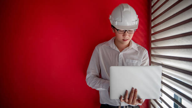 Asian civil engineer man working at construction site