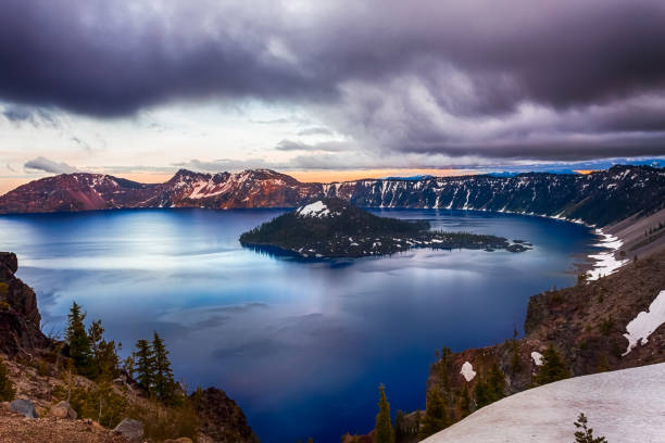 istock Crater lake and Wizard Island at sunset 1252411849