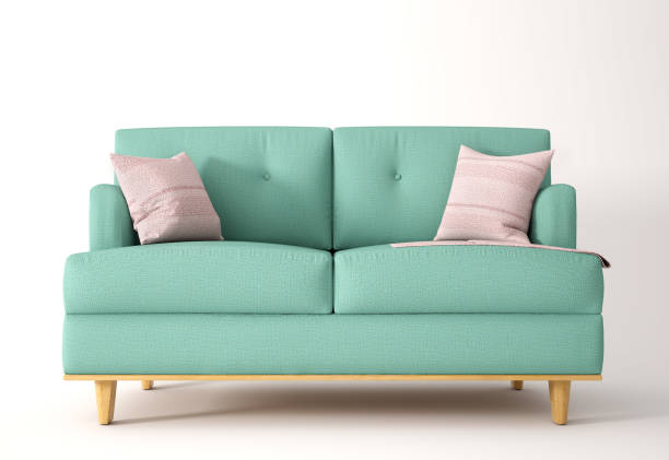 Green sofa on white background with a plaid and pillow, 3d rendering