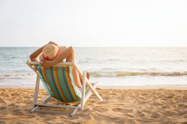 istock Woman on beach in summer 1252416757