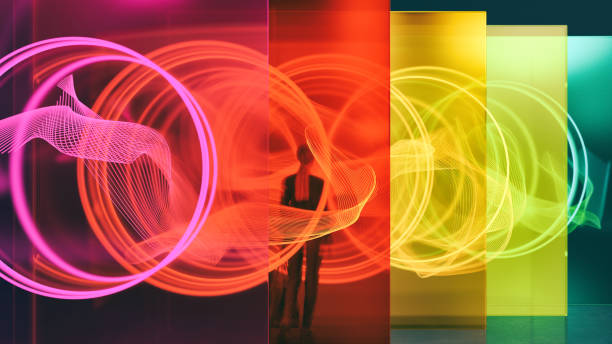 Illuminated glass wall A person standing among glass walls illuminated by glowing rings. All objects in the scene are 3D augmented reality app stock pictures, royalty-free photos & images