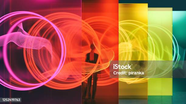 Illuminated Glass Wall Stock Photo - Download Image Now - Technology, People, Abstract