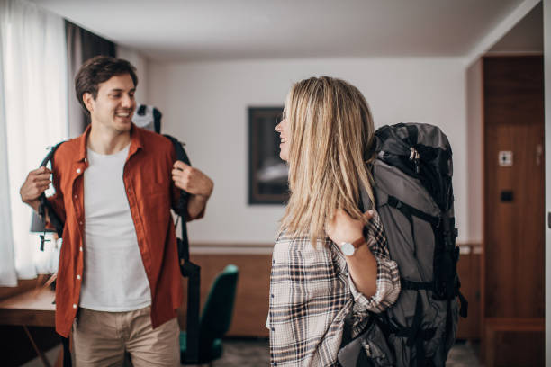 istock Couple arrived at their hotel room on vacation 1252419837
